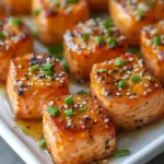 inesboulila A close up of ultimate honey garlic salmon bites ar 9b142f0f 77af 4482 8aa5 8d70933fb004