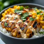 inesboulila A close up of a loaded street corn chicken rice bow 158b70e0 d7a5 44cd 92b8 49c8c88ab212 1