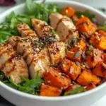 inesboulila A close up of chicken and sweet potato bowls for tw e03f11a2 ac19 4fc7 8a36 7041ed0a7cd3
