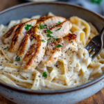 inesboulila A creamy bowl of chicken Alfredo pasta served in a 8471d8f9 7f52 4279 ad70 0221ef730797