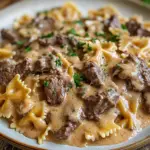 inesboulila A delicious plate of cheesy beef and bowtie pasta s db431260 9183 4448 9654 c6c0e146846c