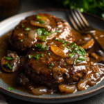 inesboulila A hearty plate of Salisbury steak featuring juicy w 6b4e793d 4429 4a5d 9b92 821bd8a28b65