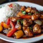 inesboulila A plate of black pepper chicken featuring tender go 34aebeb0 9b8a 4809 bc5e 342884868569