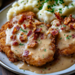 inesboulila A plate of crispy golden brown country fried pork c 7978fe7c 0709 4a94 9df8 4a05fa828b63