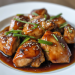 inesboulila A plate of tender bourbon chicken pieces glazed wit a20e05ca f87b 41bc b5ec 57a09b3b6065