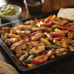 inesboulila A rustic sheet pan filled with sizzling chicken faj 0ac1c958 0385 48d7 a1a5 5c1781667d0d
