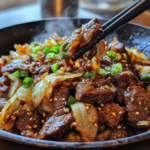 inesboulila A sizzling plate of Savory Stir Fried Beef and Cabb b2870dfa cc66 4466 af3d 2274c12b159f