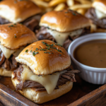 inesboulila A tray of French Dip Sliders packed with layers of 043cd0d7 08b7 47d8 9ac2 837c6d1106f0