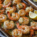 inesboulila A tray of garlic Parmesan roasted shrimp glistening 00797931 a4cd 451f a92d 9c2d995e9c67