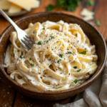 inesboulila A bowl of creamy cottage cheese Alfredo pasta featu 4b129a9f 9c05 44cc b4c8 417022702514