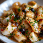 inesboulila A close up of a beautifully plated keto garlic squi a77c0483 19f2 4ecd 9bd9 34f394ff9cab