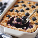 inesboulila A freshly baked dish of blueberry baked oats golden 949ca9bd fde3 4b91 ada2 26ca5171891e