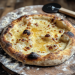 inesboulila A freshly baked sourdough discard pizza with a gold 8650dccf ef12 4daa 89d9 985c8008e883