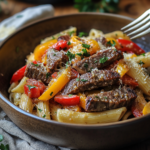 inesboulila A hearty plate of pepper steak pasta featuring tend 570b3536 63fa 4c82 bdce 77f50ddc20ef