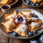 inesboulila A plate of Air Fryer Blueberry Cheesecake Wontons g 6a6a347b 2622 4bfa 876e 8b6e8b5c1c83