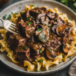 inesboulila A plate of Beef Stroganoff featuring tender slices 9b0755a6 2b5c 402b b8b5 2c7ce18dd72a