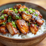 inesboulila A steaming bowl of sticky chicken rice served in a cb4d7485 bffd 43ee 8126 13aff3199905